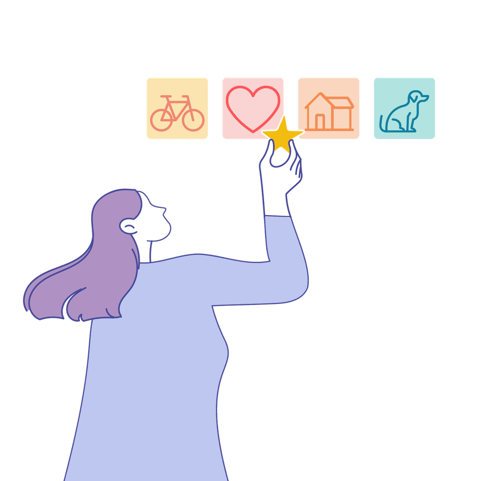 Eine Person hängt einen Prio-Stern an eins von vier Feldern mit unterschiedlichen Symbolen